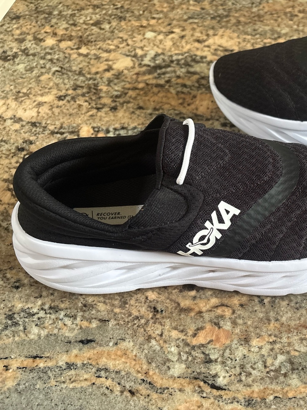 Hoka Recovery Black and White Slip-On
